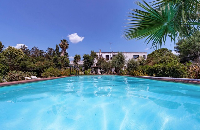 Villa "Olivia Pool Tennis Spa - D" con piscina compartida, terraza privada y Wi-Fi