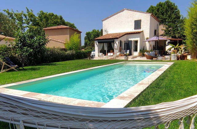 Villa on landscaped grounds with large swimming pool