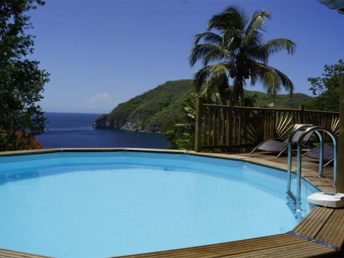 Villa Palma avec vue mer et piscine privée location Domaine de la Pointe Batterie à Deshaies