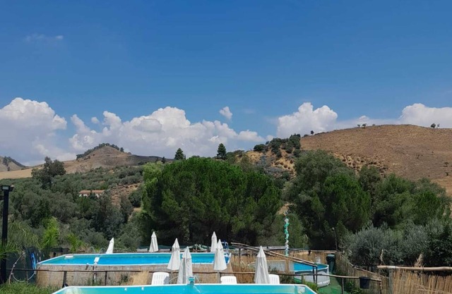 Villa "Parco Morello Piano Terra" con vistas a la montaña, piscina y Wi-Fi