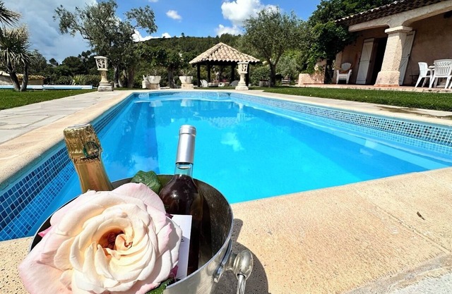 Villa with private heated pool in mid-season