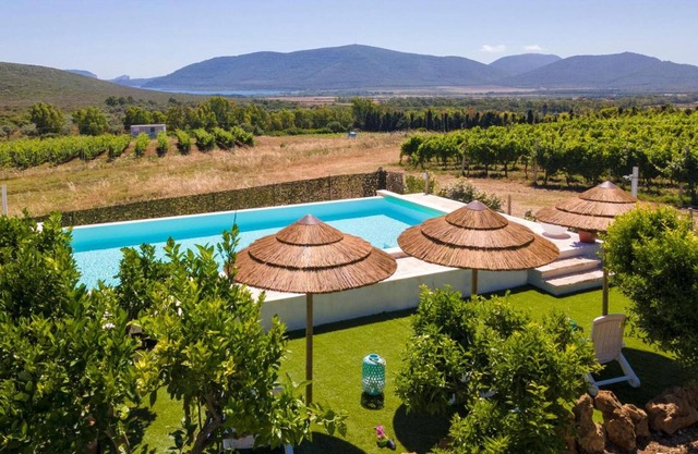 Villa 'Residenza Alla Collina Porto Ferro' with Sea View, Wi-Fi and Air Conditioning