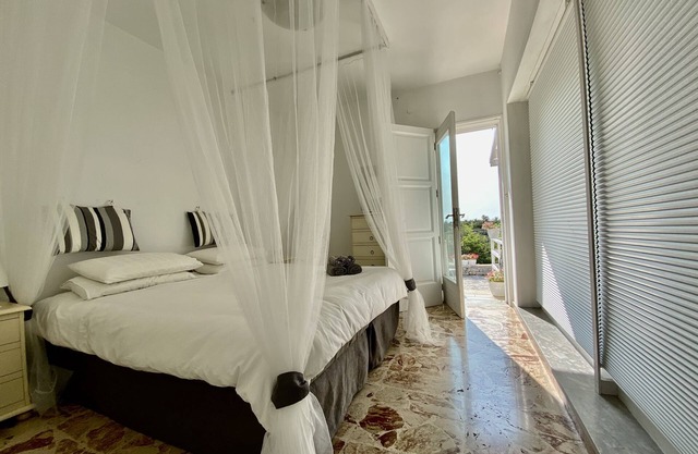 Villa right on the beach. Designed to step off the world directly onto the beach