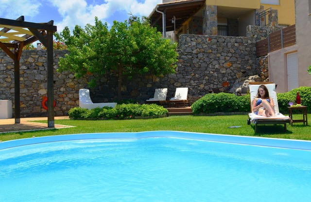Villa with breathtaking views. Sandy beach 8 minutes away by car.