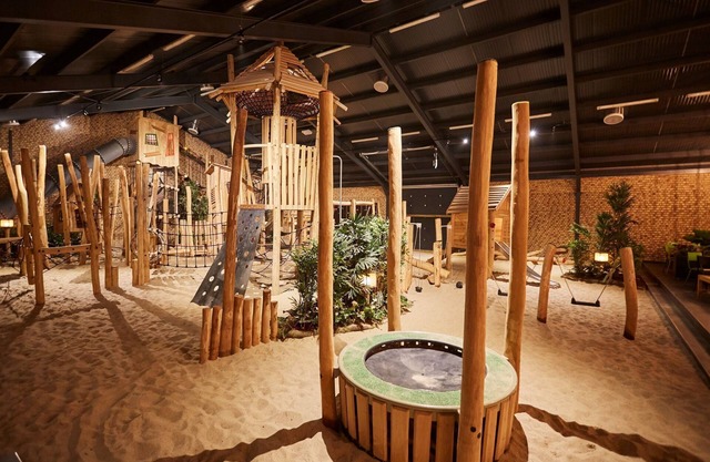 Villa moderna con habitación infantil temática en un parque de vacaciones en Limburg