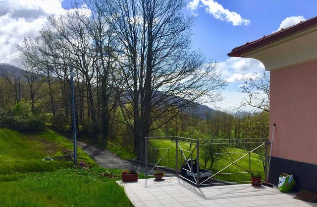 Casa vacacional con terraza y vista panorámica