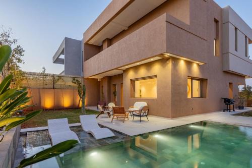 Villa Yas, 20min du Centre, Piscine Chauffée, Cuisinière, Chauffeur, Air Hockey, Ping-Pong & Jeux de Société