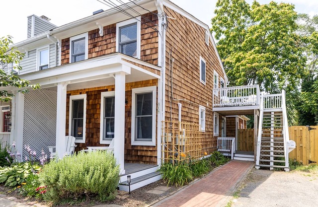 Walk everywhere from 1st floor dog-friendly apartment with parking and backyard