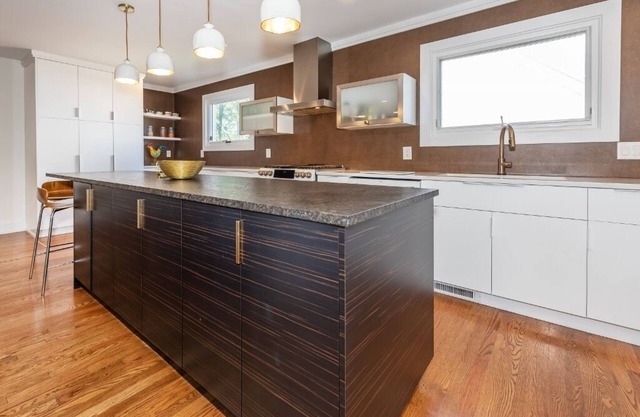 Walk to the Big House from this Stylish Home.