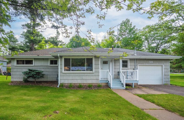 Walking distance to public beach, boat landing, and downtown Balsam Lake