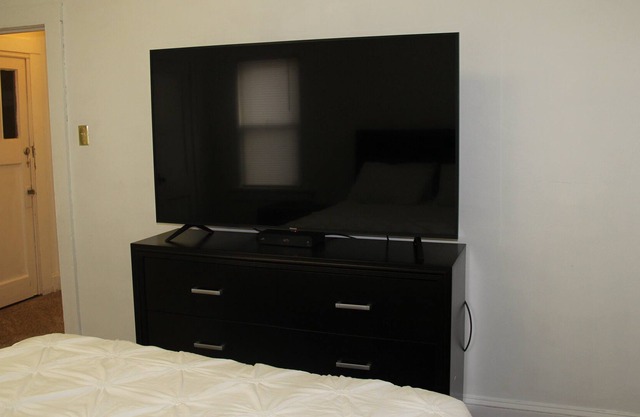 Walking distance to food, library, post office, banks, and more.