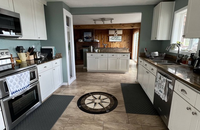 Watch the Boats Go By at Mariner’s Rest. A Wonderful Waterfront Family Home