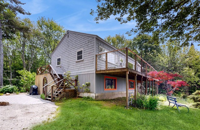 Water view home with scenic balcony, grill, board games, and AC