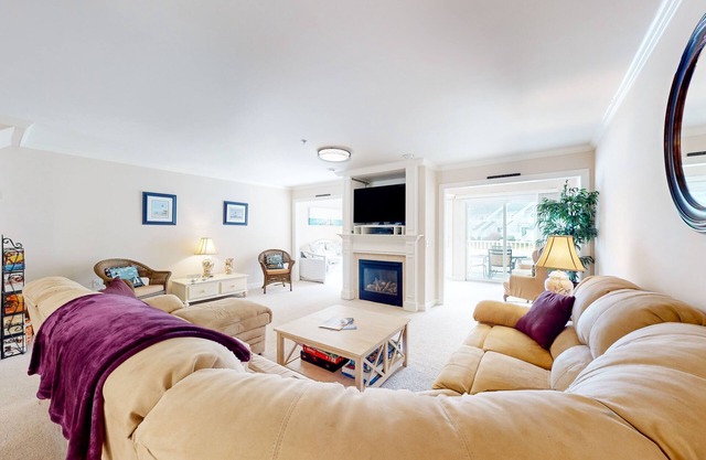 Water-view West Ocean City's hidden gem w/pool access, private deck & fireplace