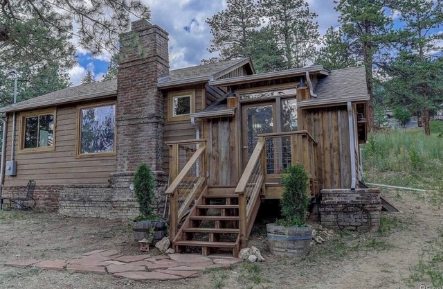 waterfall, tanning patio, fireplace, hammock, full kitchen