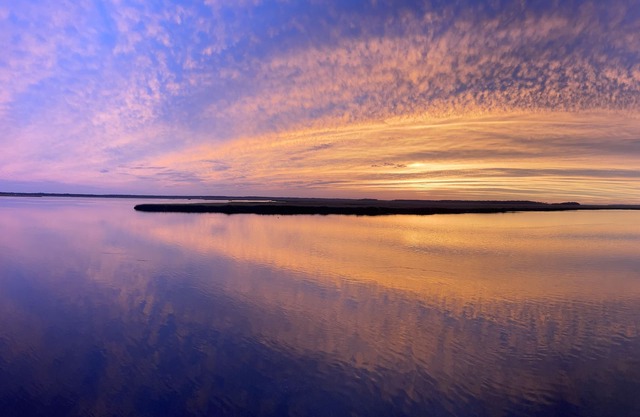 Waterfront campsite, a serene oasis for nature lovers and fishing enthusiasts!