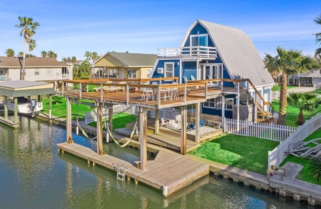 Waterfront Canal Retreat with Cowboy Pool & Dock