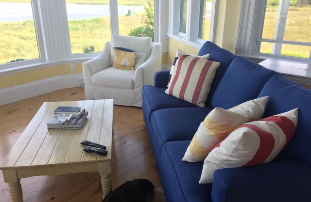 Waterfront cape walk to two long, sandy beaches in pastoral seaside settlement