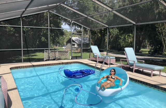 Waterfront Estate over an acre on the water with Large Heated Pool