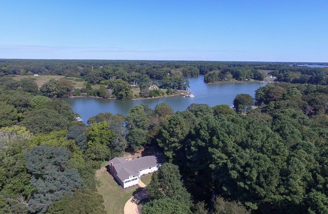 Waterfront family home with great views, full kitchen, & strong Wi-Fi.