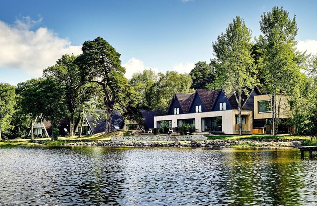 Waterfront heaven with hot tub and sauna.