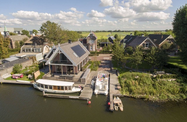 Waterfront holiday home with its own mooring