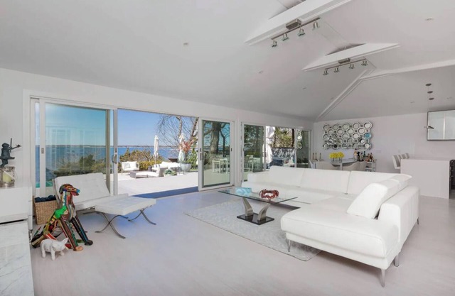 Waterfront home, infinity pool, private beach, and amazing sunsets!