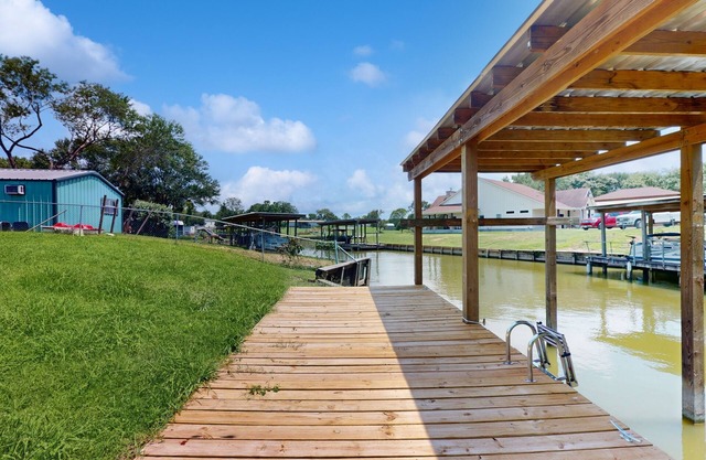 Waterfront home with private deck, washer & dryer, and internet