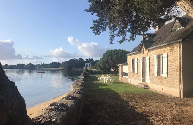 Waterfront house with large walled garden