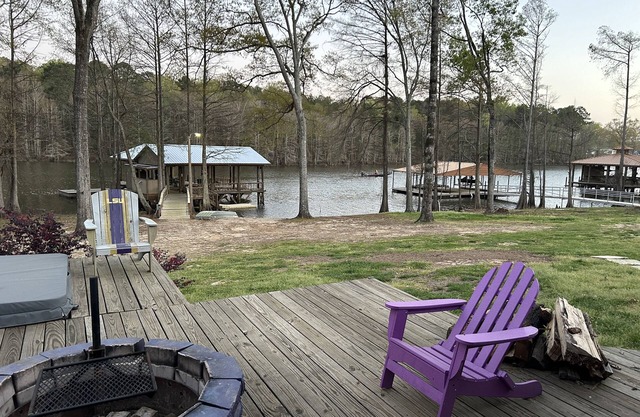 Waterfront house with boathouse, boat launch, outdoor kitchen, fire pit