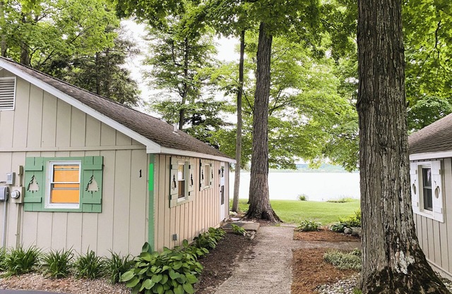 Waterfront Lake Leelanau Cottage with Shared Private Beach