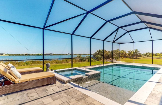 Waterfront modern home with pool & hot tub
