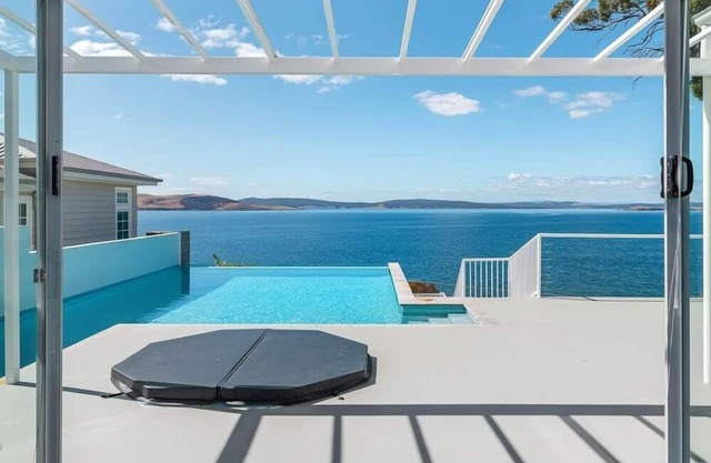 Waterfront Oasis with Infinity Pool and Stunning River Views