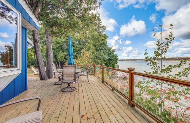 Waterfront Suttons Bay Cottage w/ Fire Pit!