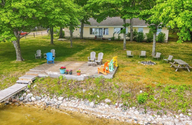 Waterfront Torch Lake Cottage w/ Dock & Fire Pit!