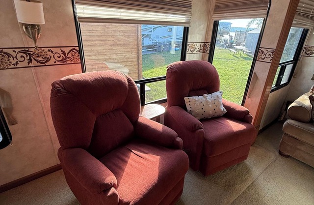Waterview Trailer on Georgian Bay w/ kayaks and paddleboard and sandy beach