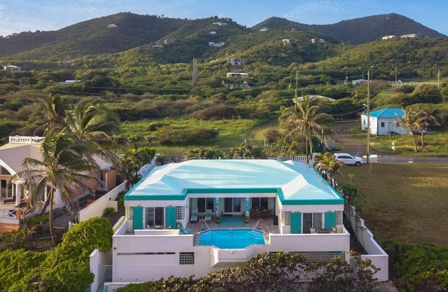 Welcome to Corals Edge! Your Oceanfront Oasis awaits you! 4 bedrooms, 3 baths!