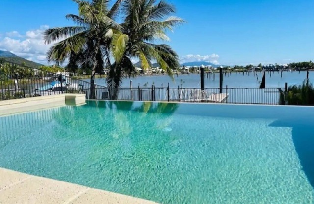 Welcome to 'Hinchinbrook Escape' Waterfront Townhouse with Marina Berth Pool Spa