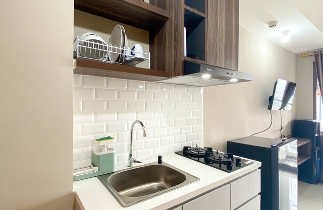 Well Furnished and Cozy Studio at LRT City Jatibening Apartment