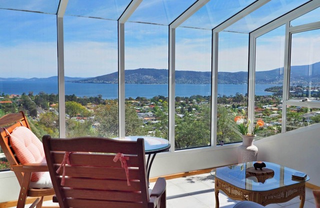 Well Located Family Home with Magnificent Panoramic Harbour and Mountain Views