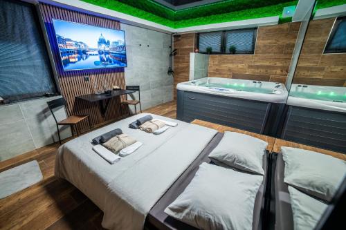 Wellness & Penzion, Laudom