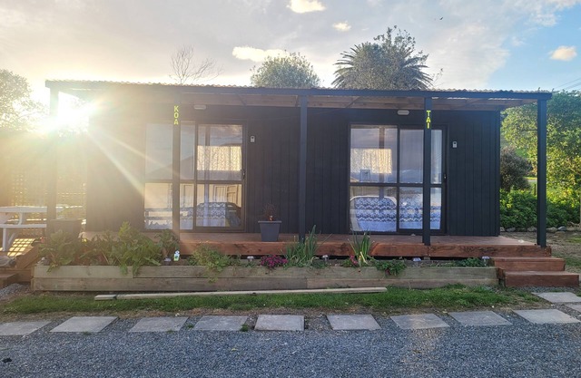 Whare Koa awaits to provide that relaxing ambience for you with all day sun!!