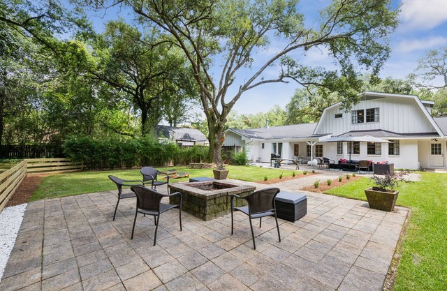 "Whispering Oaks" Enjoy this 4-bedroom home with HUGE backyard