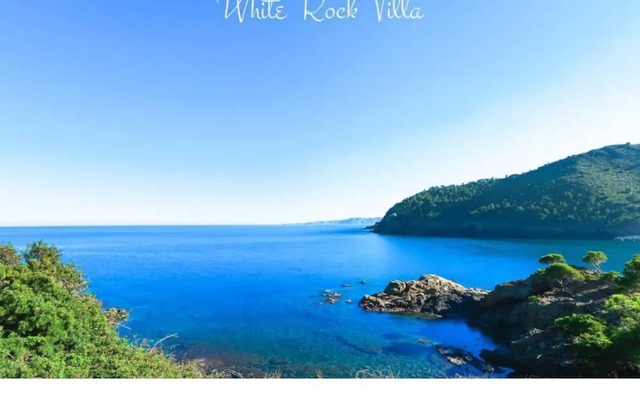 White rock villa with breathtaking views and pool
