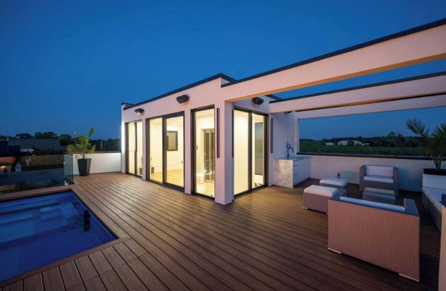 Wine, Water and a rooftop pool. This dream waterfront home has it all..