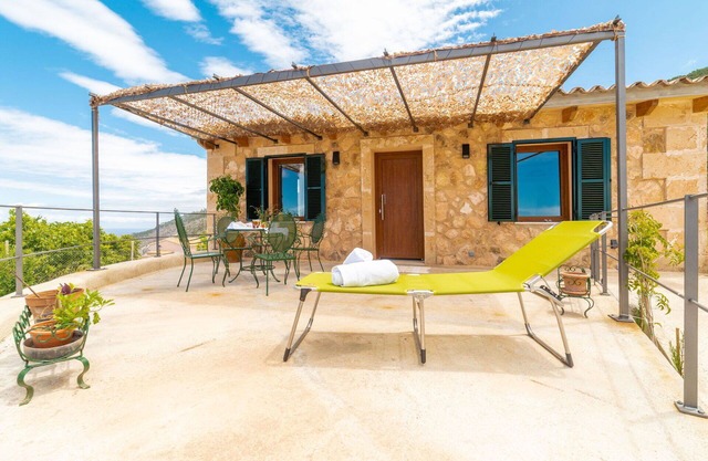Estupenda casa de vacaciones privada para 2 personas con A/C, WIFI, TV, patio y aparcamiento