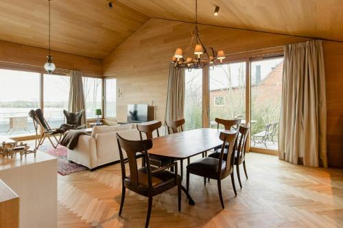 Wood Clad House At Eider's High Shore