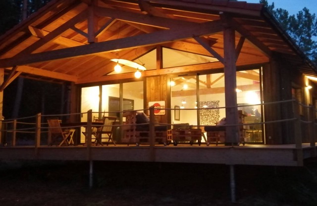 Wooden house on piles in a private forest of 1.3ha 350m from the village 4kms from the beach