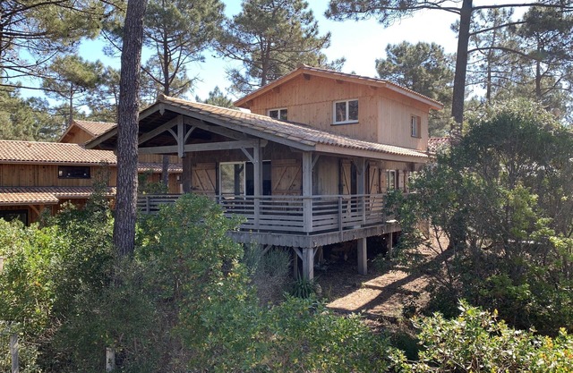 Casa de madera cerca del mar en subdivisión cerrada. Clasificado 3 estrellas