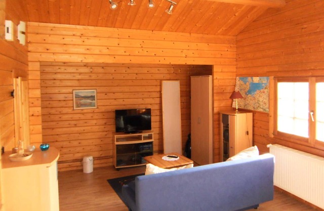 Casa de madera en el lago, Alemania